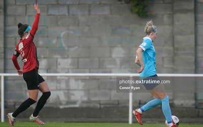 Sophie Watters Bohemian FC raises her arm to claim a throw in as Shauna Fox, Shelbourne FC sees the ball over the side line.