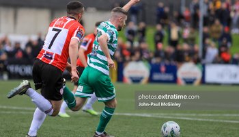 Jack Byrne on the ball with Michael Duffy in close attendance