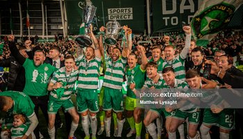 Shamrock Rovers celebrating their double win with the league and FAI Cup trophies after thier cup final win over Cork City in November 2025