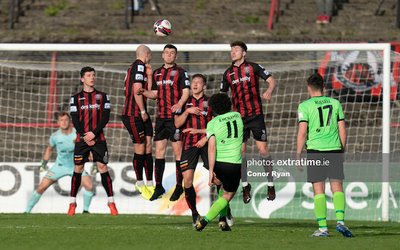 Barry McNamee of Finn Harps sees his free kick clear the Bohemian FC wall and crossbar.