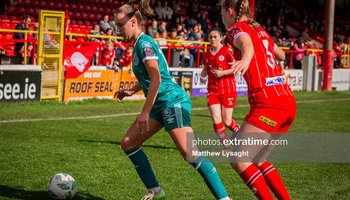 Shamrock Rovers' Joy Ralph on the ball ahead of Shelbourne's Leah Doyle in the league clash in Tolka Park in April 2024